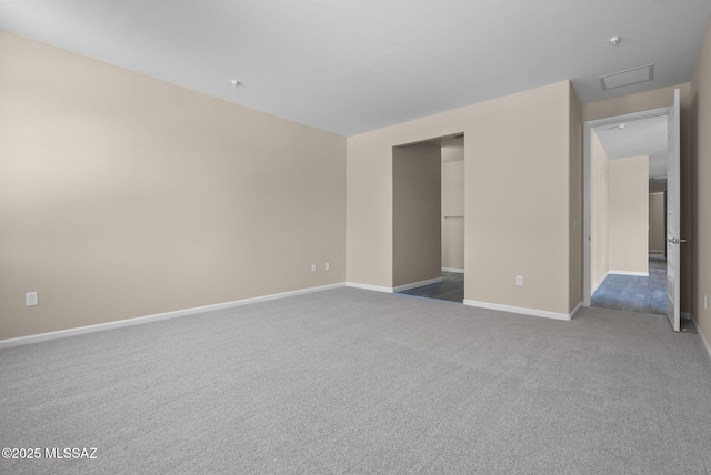 unfurnished bedroom with a closet and dark colored carpet