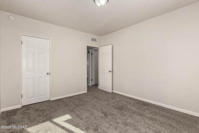 unfurnished bedroom featuring carpet