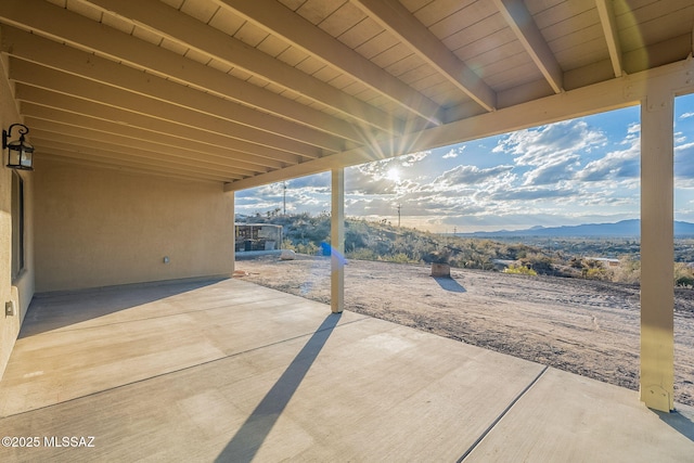 view of patio / terrace with a mountain view