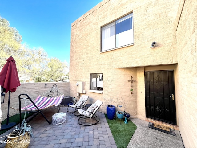 rear view of property featuring a patio