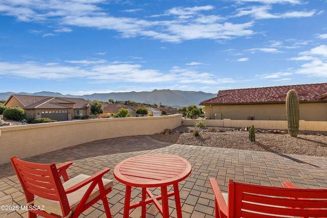 view of patio featuring a mountain view