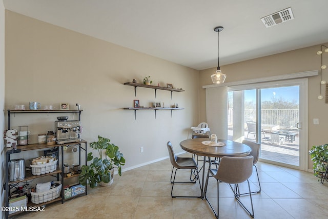 view of tiled dining space