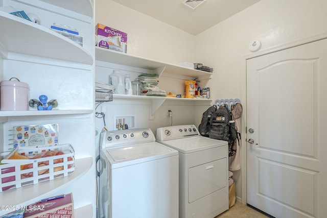 laundry room featuring washer and dryer