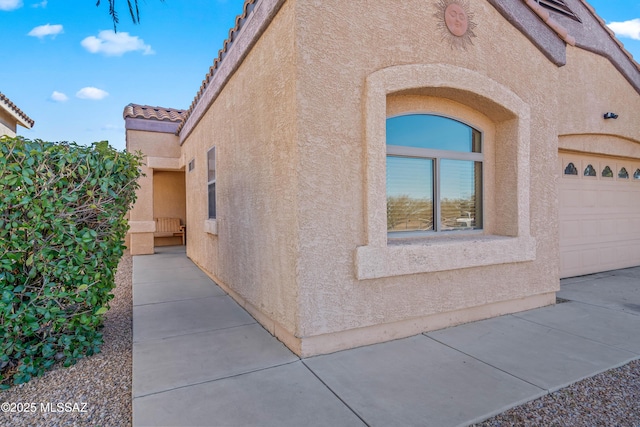 exterior space featuring a garage