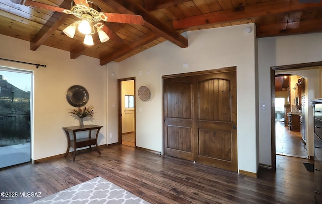 unfurnished bedroom featuring a closet, wood ceiling, lofted ceiling with beams, and dark hardwood / wood-style floors