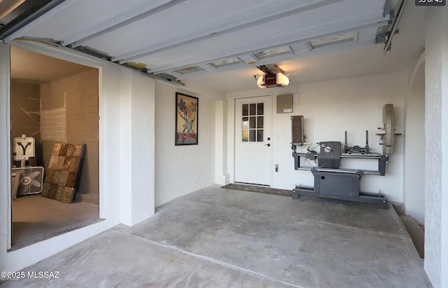 garage featuring a garage door opener