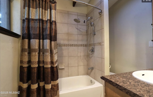 bathroom featuring shower / bath combination with curtain and sink