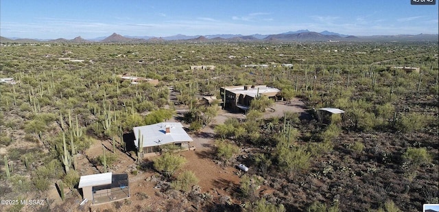 drone / aerial view featuring a mountain view