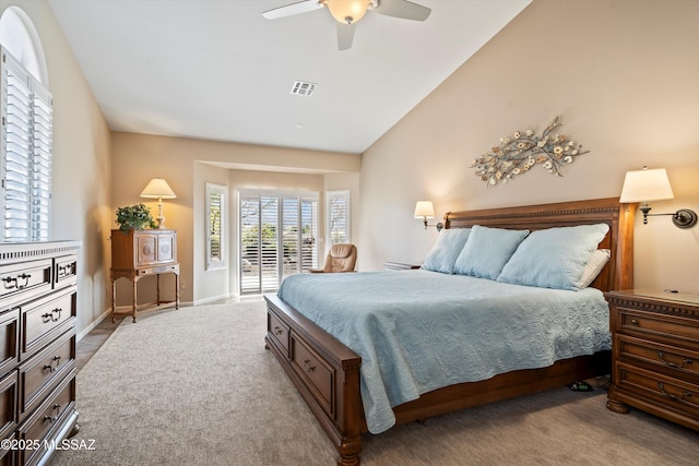 carpeted bedroom featuring vaulted ceiling, access to exterior, and ceiling fan