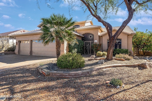 view of front of property featuring a garage
