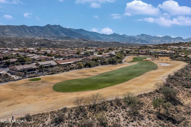 surrounding community with a mountain view