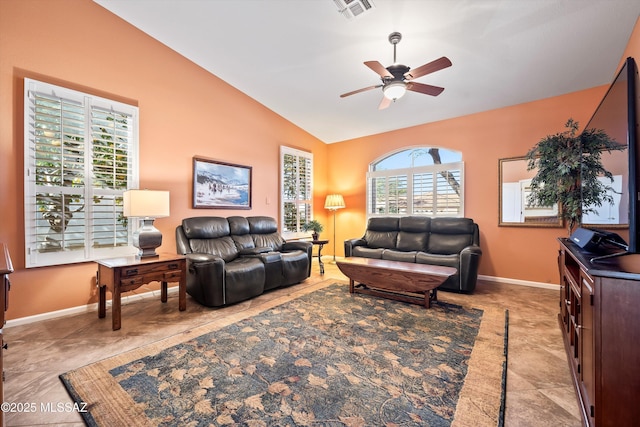 living room featuring ceiling fan and vaulted ceiling