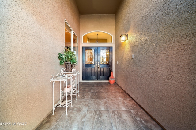 entrance to property featuring french doors
