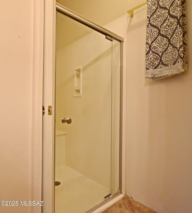 bathroom with an enclosed shower