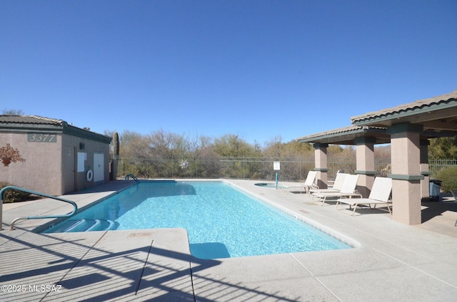 view of swimming pool featuring a patio