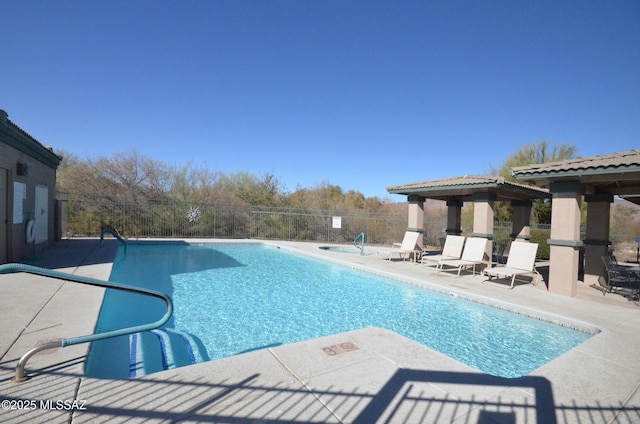 view of swimming pool featuring a patio