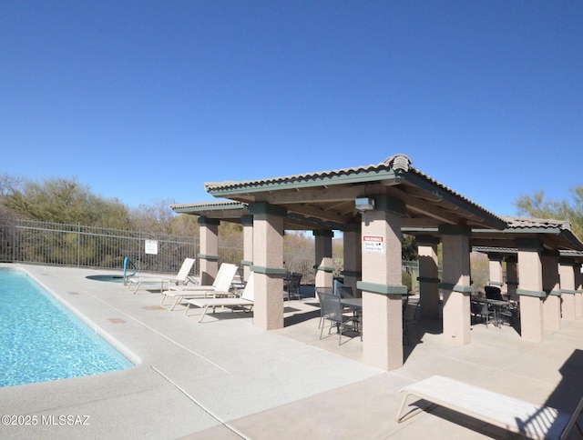 view of swimming pool featuring a gazebo and a patio area