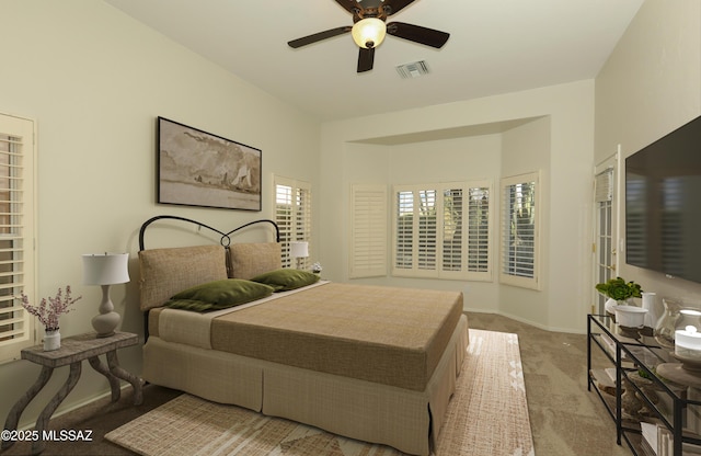 carpeted bedroom featuring ceiling fan