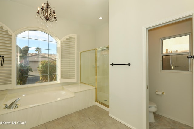 bathroom with a chandelier, tile patterned floors, toilet, and independent shower and bath