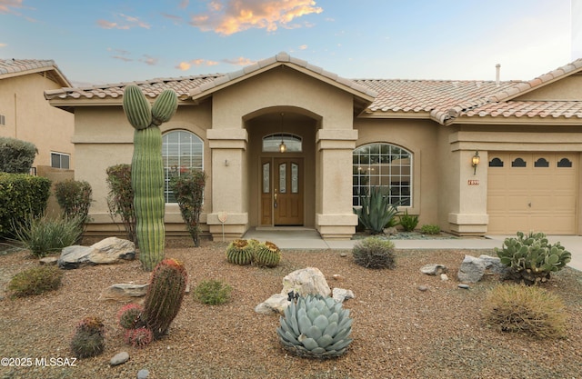 view of front of home featuring a garage