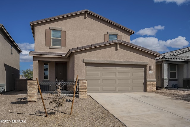 view of front of home with a garage