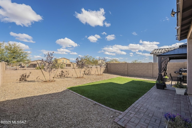 view of yard featuring a gazebo and a patio