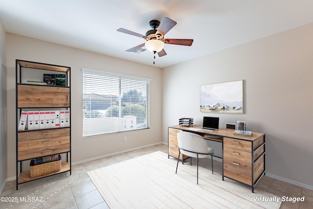 home office with ceiling fan and light tile patterned floors