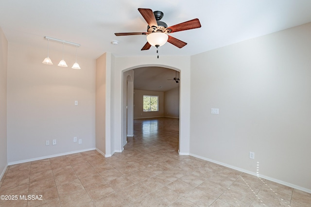 unfurnished room featuring ceiling fan