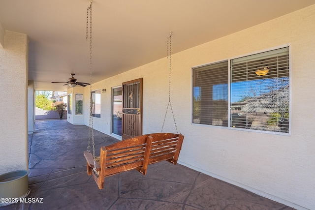 view of patio with ceiling fan