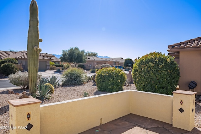 view of patio with a garage