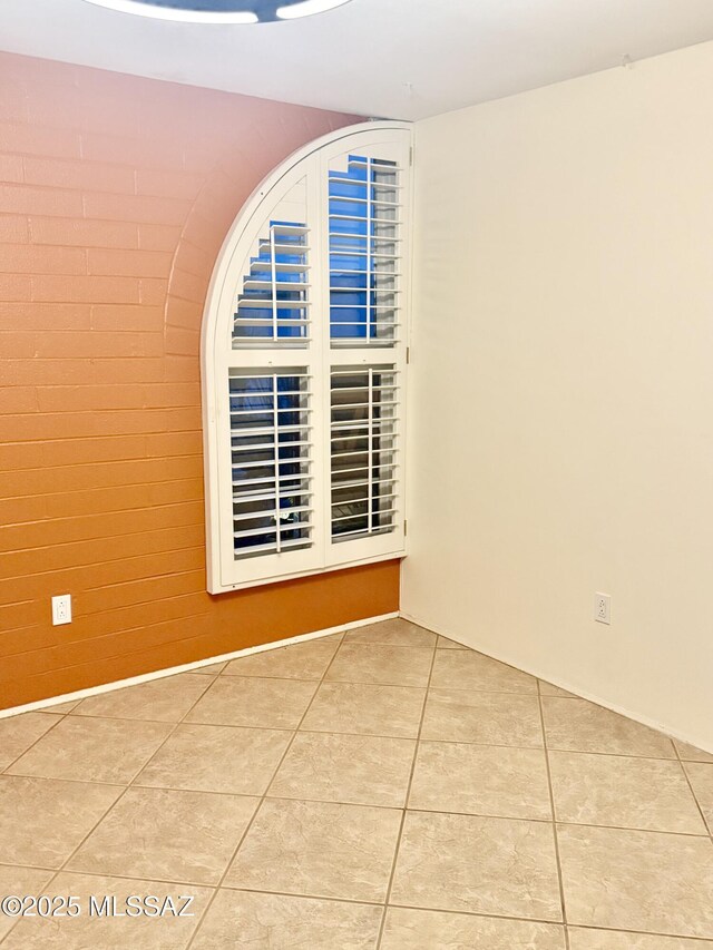 view of tiled spare room