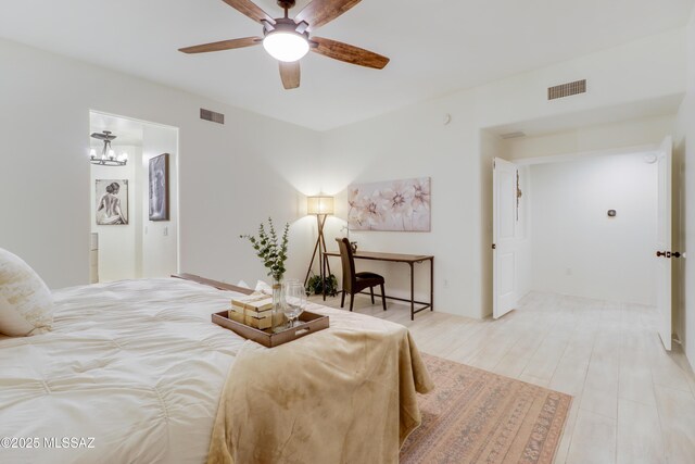 bedroom featuring ceiling fan and light hardwood / wood-style flooring