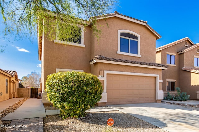 view of front of property featuring a garage