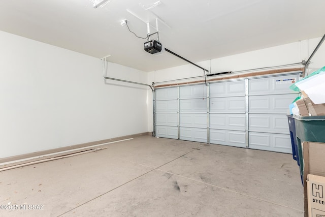 garage featuring a garage door opener