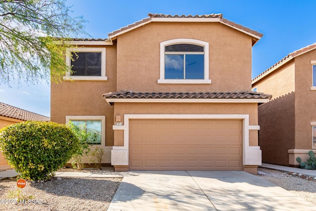 view of front of property with a garage