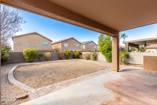 view of patio / terrace featuring ceiling fan