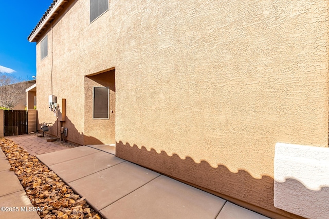 view of home's exterior with a patio area