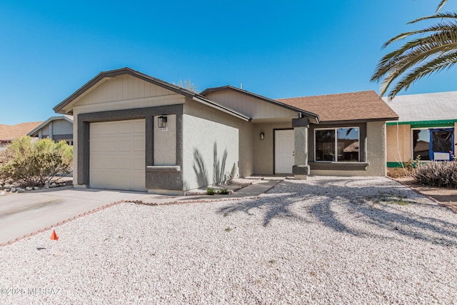 single story home featuring a garage