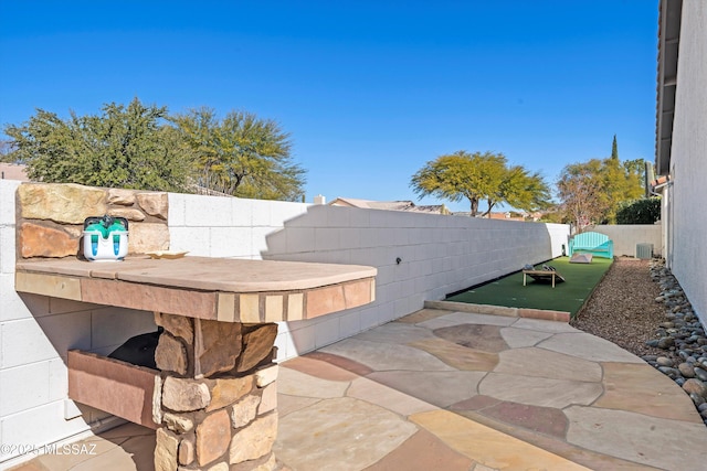 view of patio / terrace with cooling unit