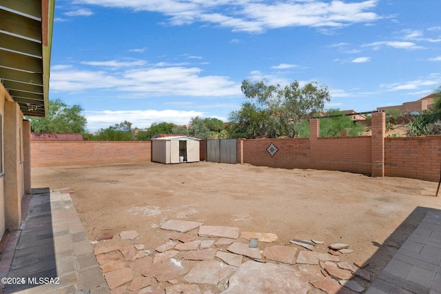 view of patio / terrace with a storage unit