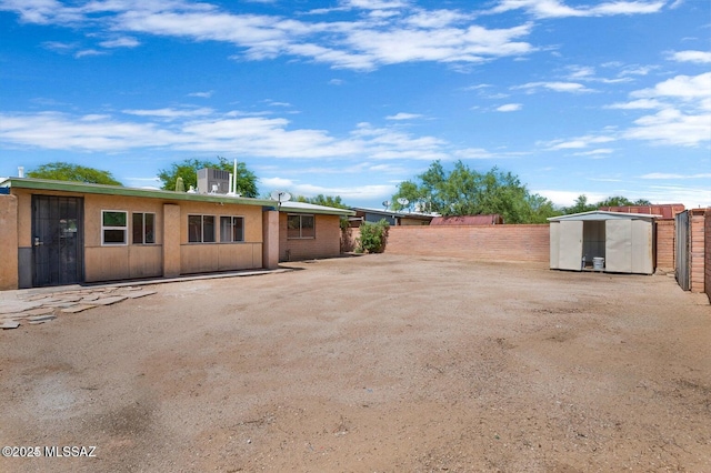 exterior space featuring a storage shed