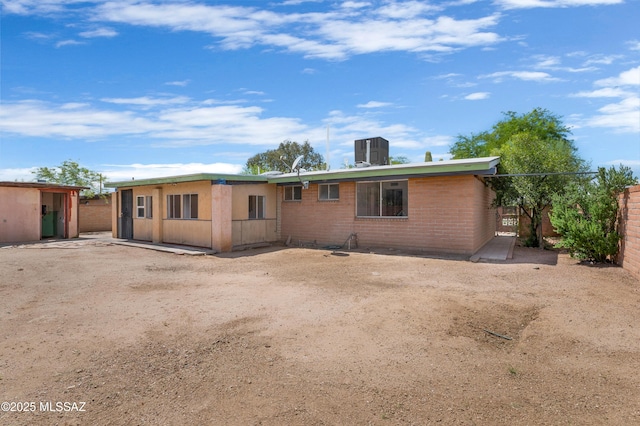 view of front of home featuring central AC unit