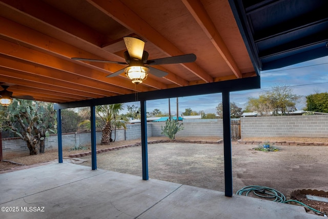 view of patio featuring ceiling fan