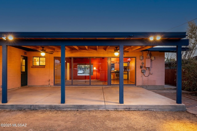 exterior space with a patio and ceiling fan