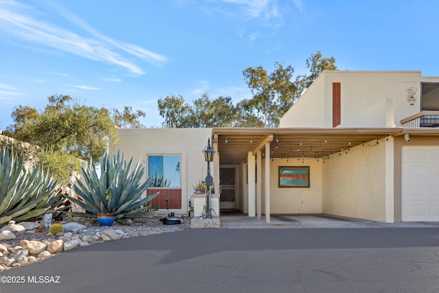 view of front of property with a carport