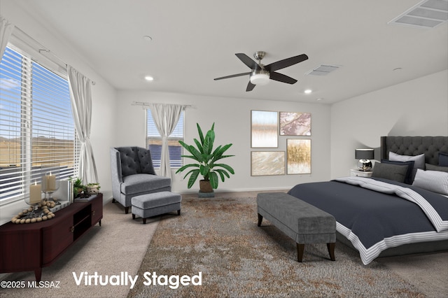 carpeted bedroom with ceiling fan