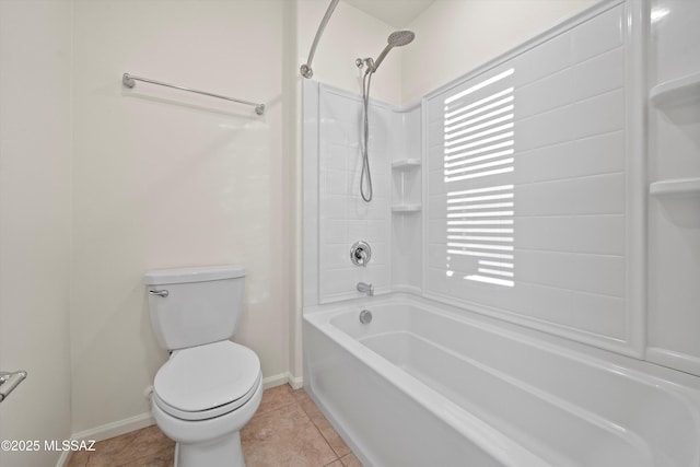 bathroom featuring tile patterned flooring, shower / bathing tub combination, plenty of natural light, and toilet