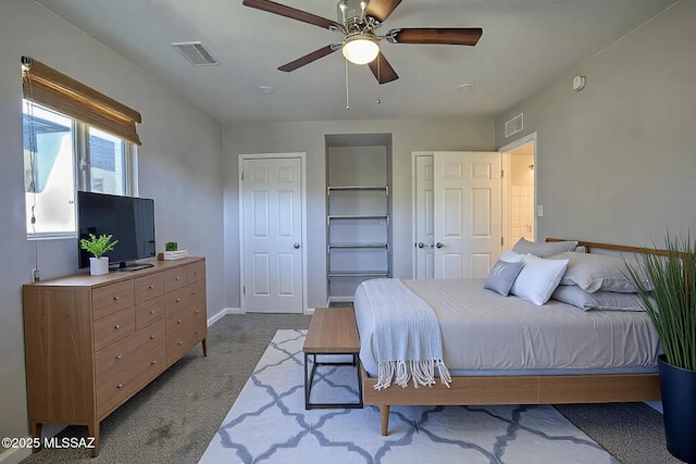 carpeted bedroom featuring ceiling fan