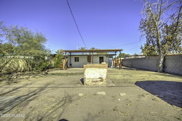 rear view of house with a patio area