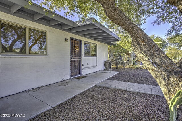 doorway to property featuring a patio